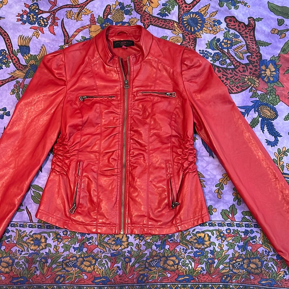 Medium Faux Leather curve fitting jacket. Perfect condition.